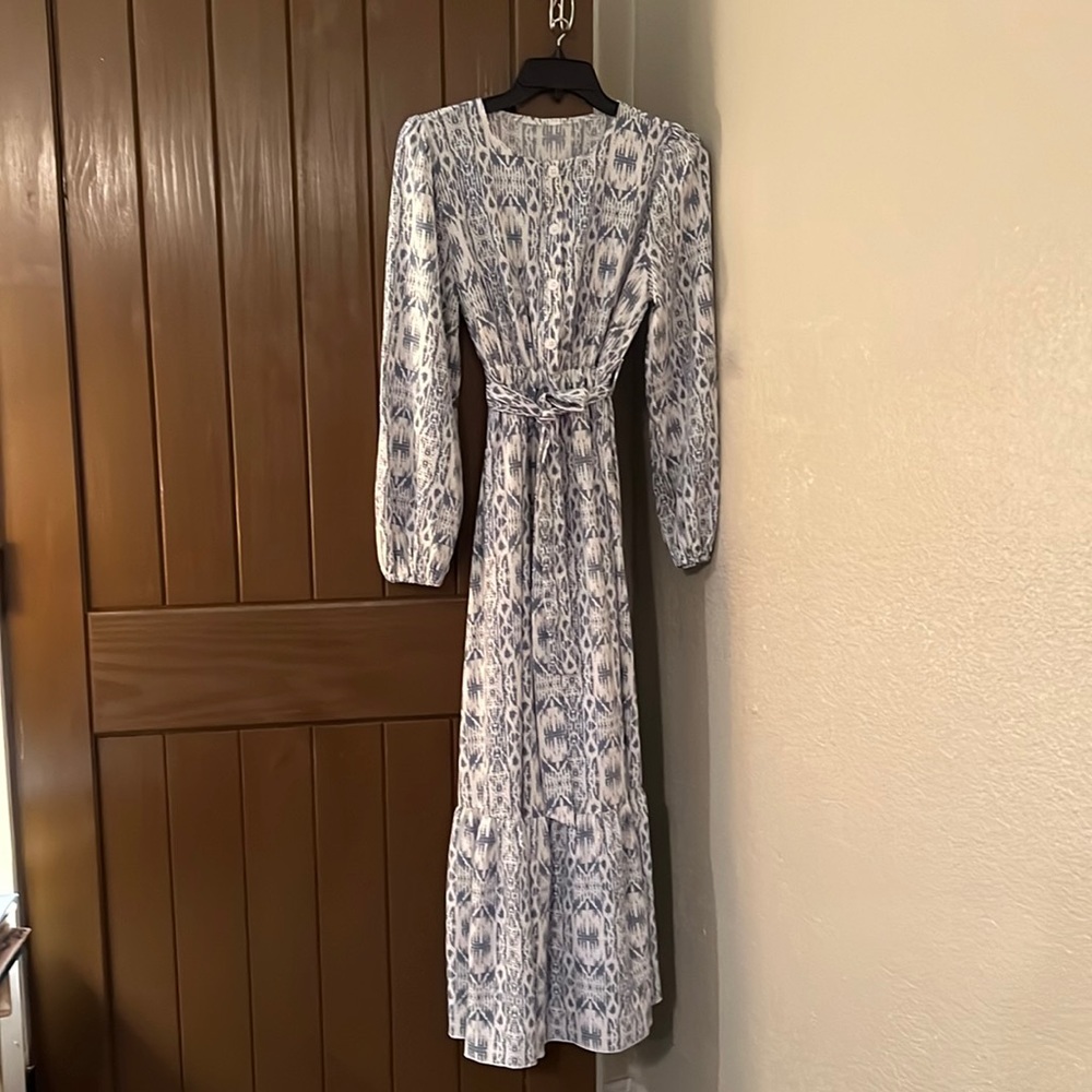 Long dress with ruffle at the bottom size small.